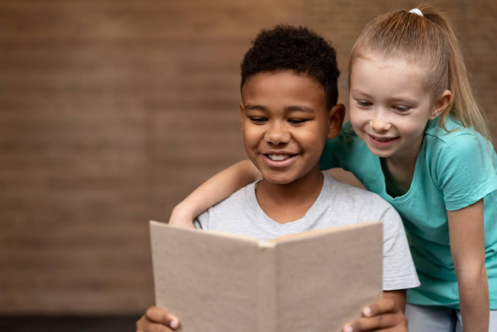 Kids reading together.